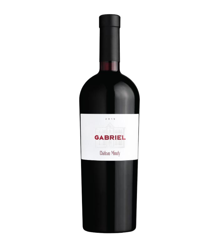 Château Minuty Gabriel Rouge boca crvenog vina s etiketom brenda.